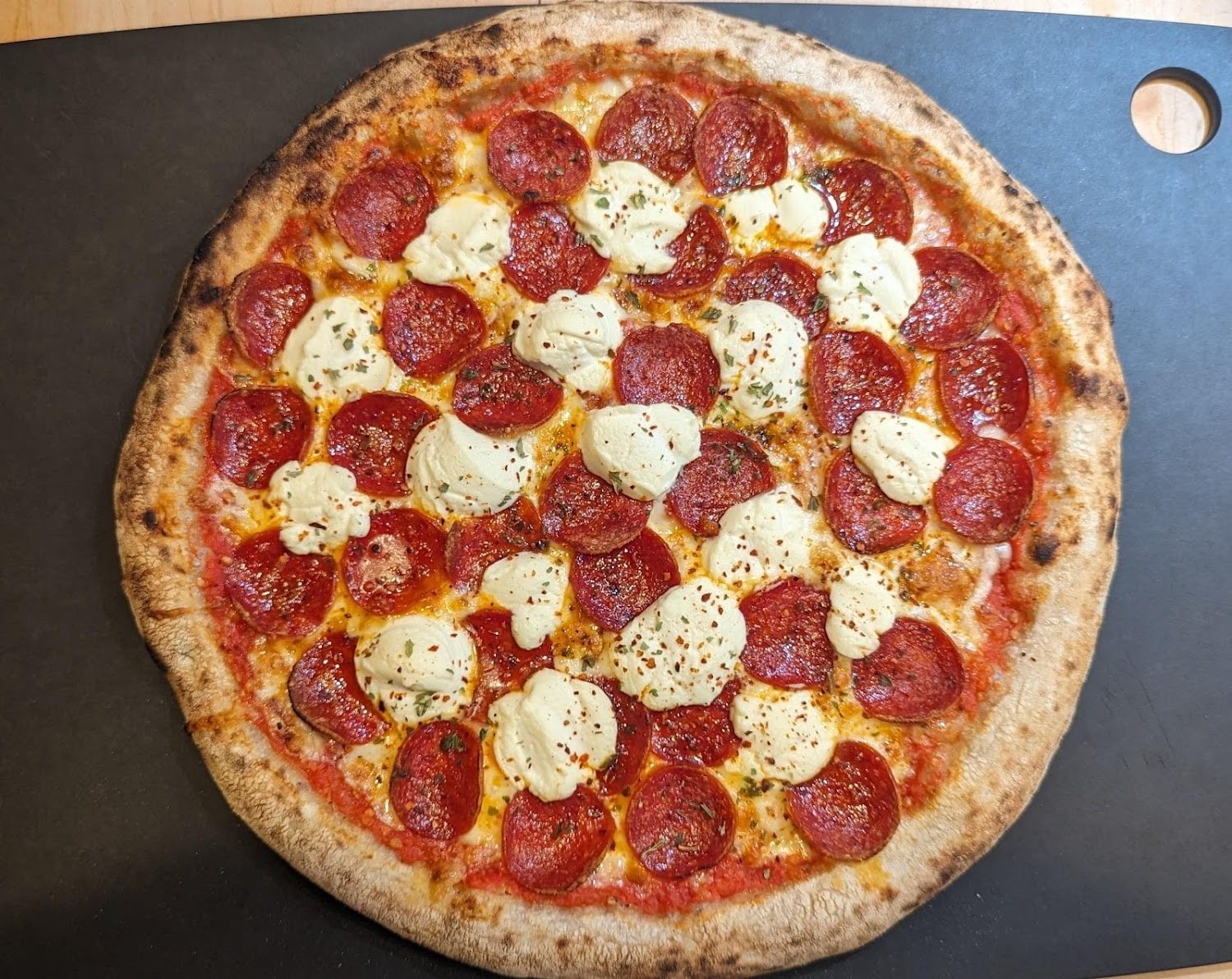 Pepperoni pizza with fresh mozzarella