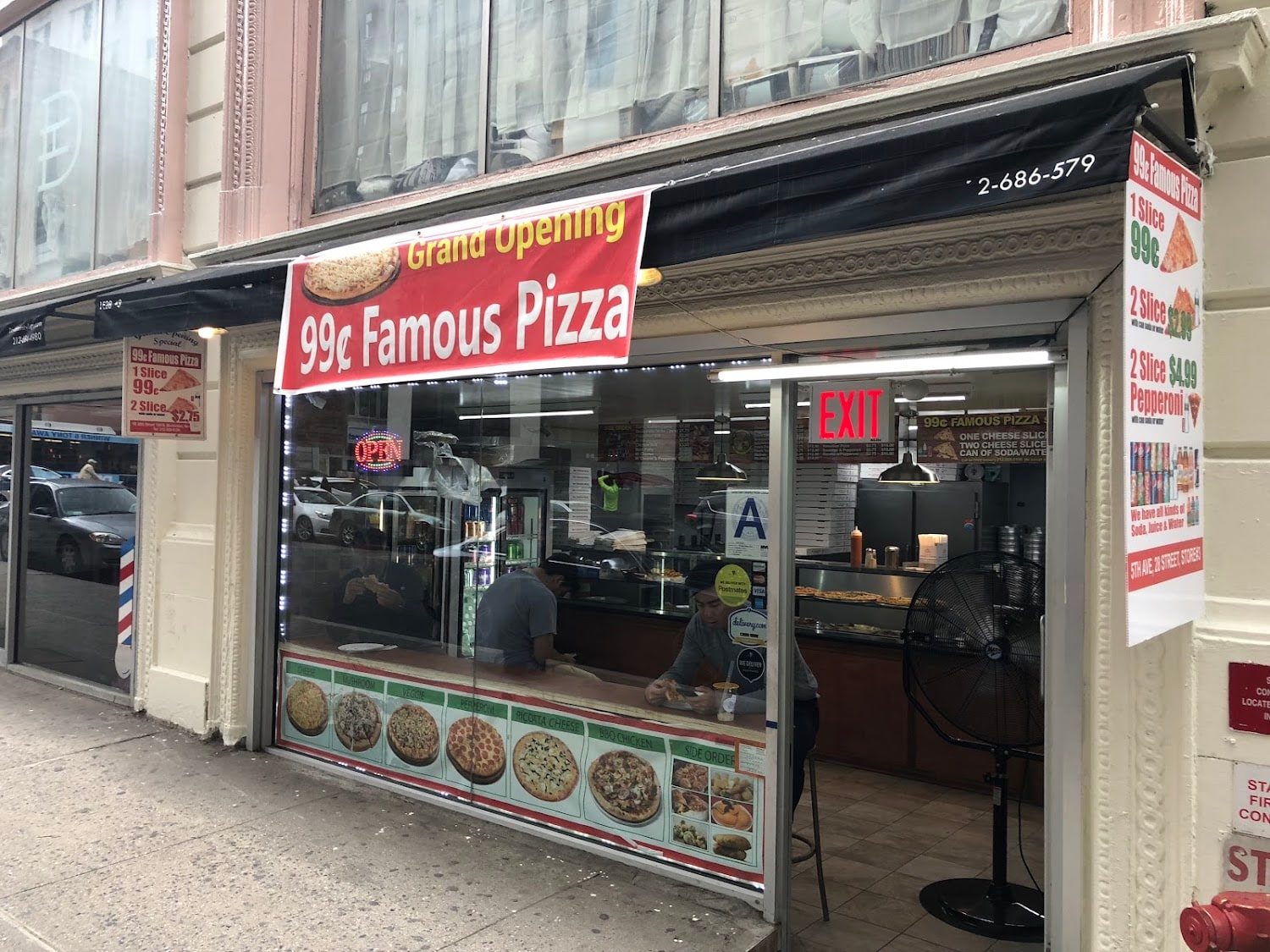 Famous Pizza shopfront with sidewalk seating